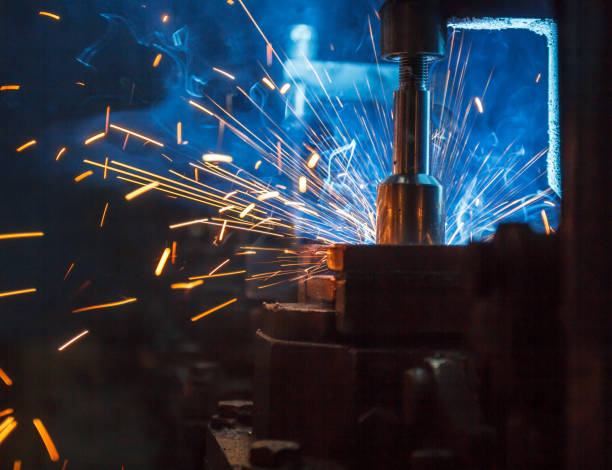 istock Welding robots movement in a car factory 685383620