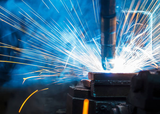 istock Welding robots movement in a car factory, 685386526