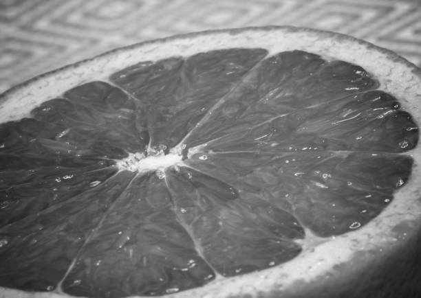 istock Grapefruit citrus fruit close up, black and white color 685386786