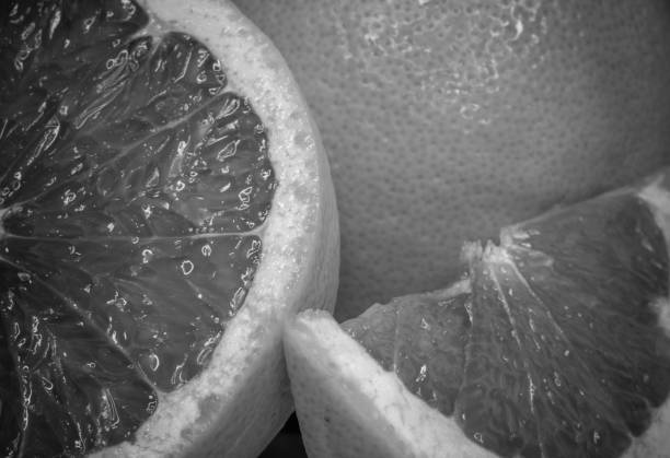 istock Grapefruit citrus fruit close up, black and white color 685386812