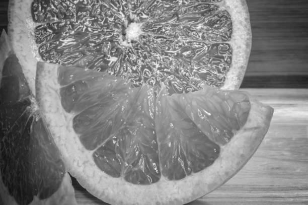 istock Grapefruit citrus fruit close up, black and white color 685386816