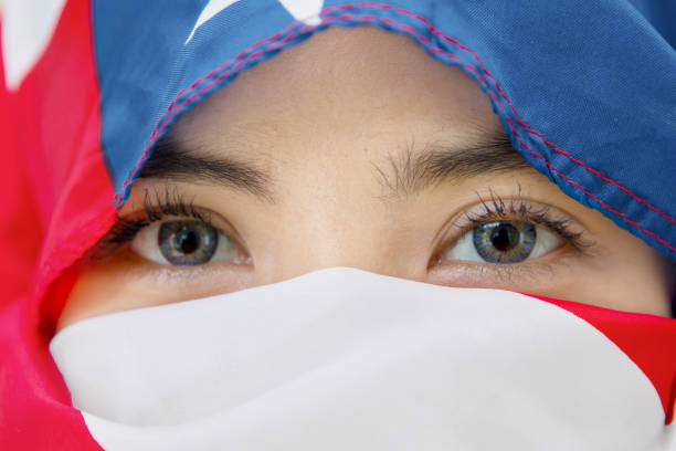 istock Caucasian female wrapped with American flag 685389262