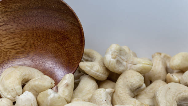 istock cashew nuts close up on white background 685389358