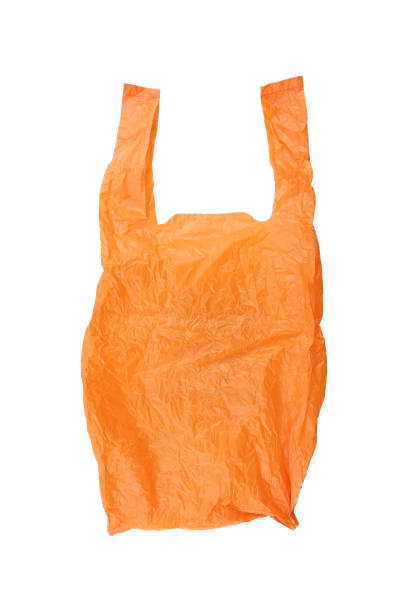 istock recycled orange plastic bag isolated on white 685389402