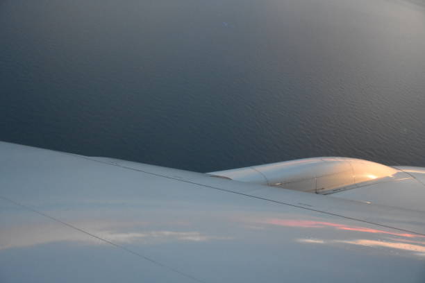 istock An orange sunset from an airplane 685406738