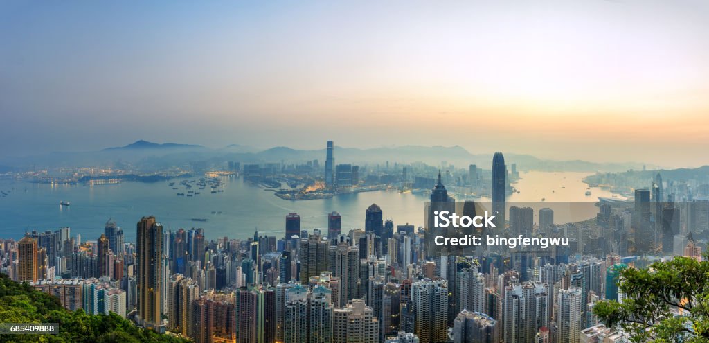 Sunrise and buildings in Vitoria harbour, Hongkong Hong Kong Stock Photo