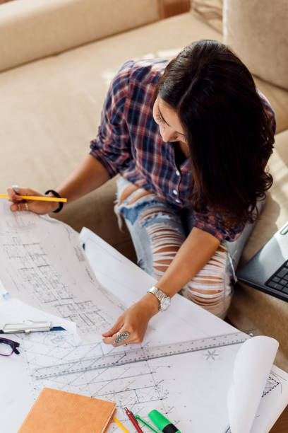 istock Young female student working at home. 685425016