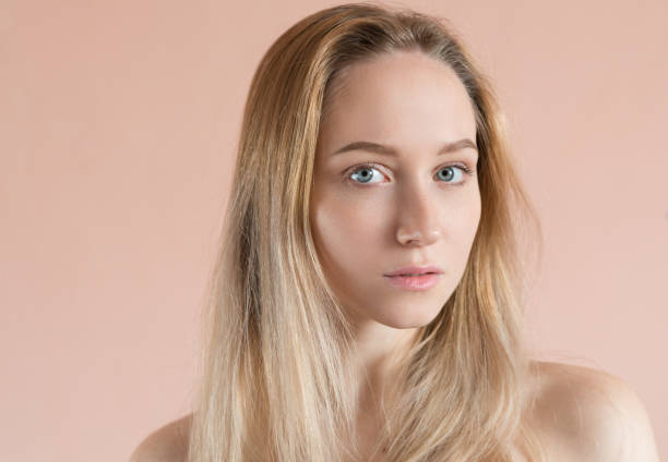 istock Young woman with blue eyes. 685427514