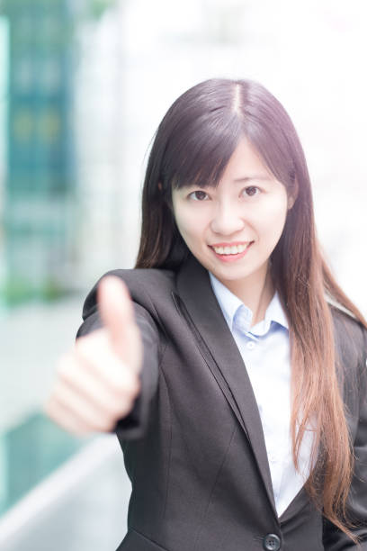 istock businesswoman thumb up 685430112