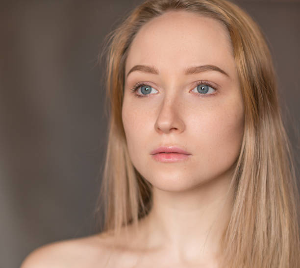 istock Young woman with blue eyes. 685436090