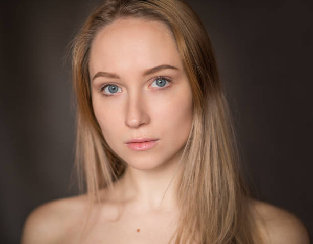 istock Young woman with blue eyes. 685436166