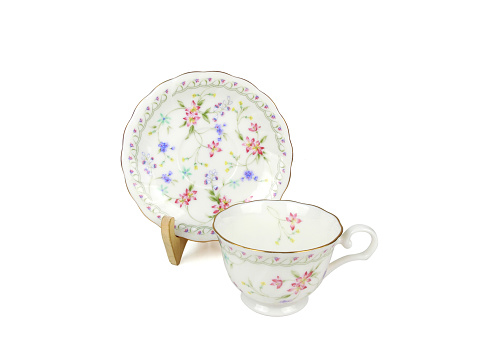 Chic porcelain set with plates and cup on transparent background