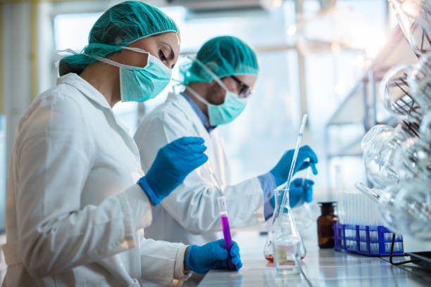 istock Young chemists working on scientific research in a laboratory. 685470816