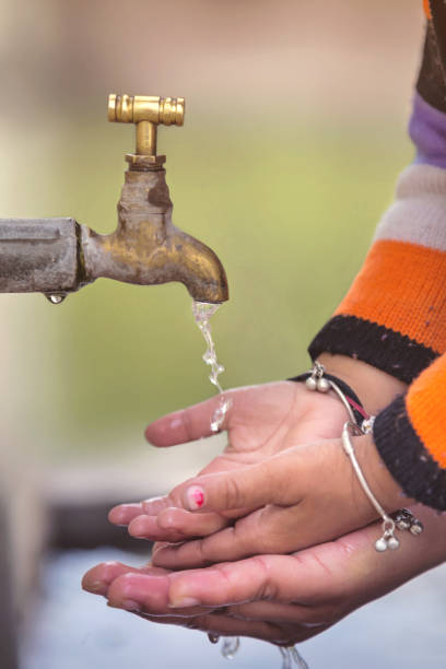 istock Mother and Child Hands Under Tap water 685476044
