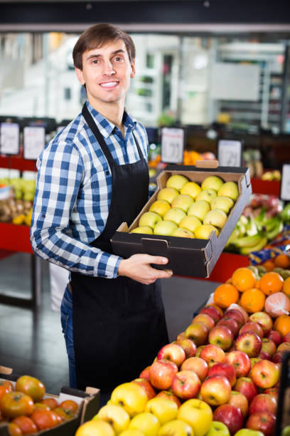 istock young man offering fruits 685478542