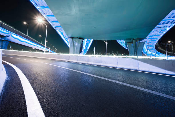 istock Empty road floor with city overpass viaduct bridge 685478632