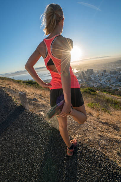 istock Young Caucasian female stretching muscles at sunrise 685484058