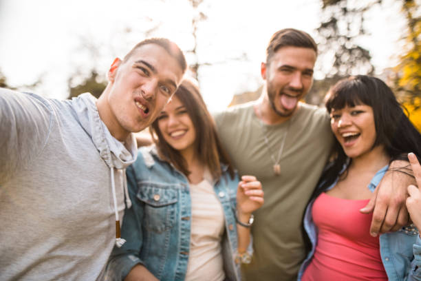 istock group of friends take a selfie togetherness 685489010