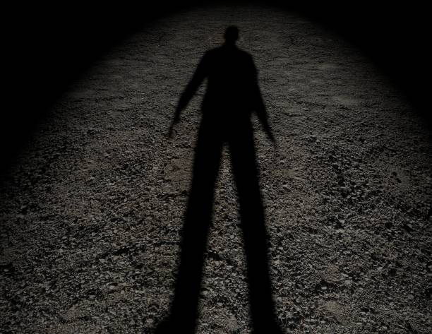 Shadow of a man on the ground texture. Shadow of a man on the ground texture. human representation stock pictures, royalty-free photos & images