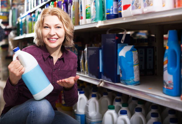 istock Woman choosing detergent in shop 685498892