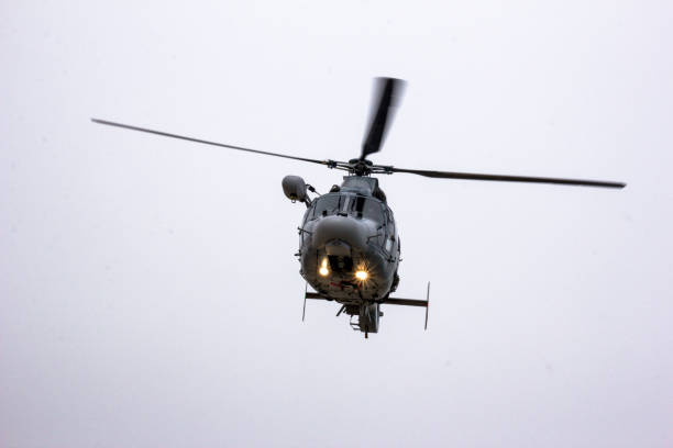 istock Military navy helicopter flying - isolated 685503832