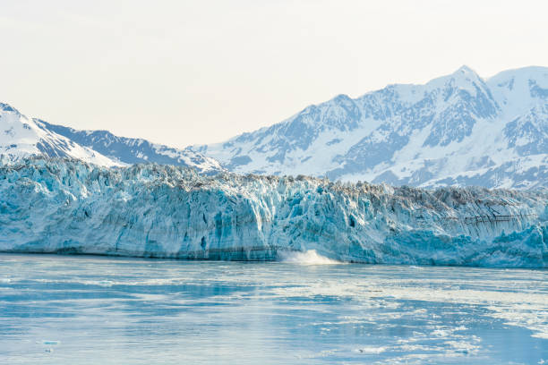 Massive Hubbard Glacier reaching water stock photo