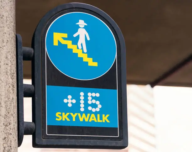 A sign for a covered walkway 'skywalk' in Calgary, Alberta - part of the city's +15 network of skywalk.