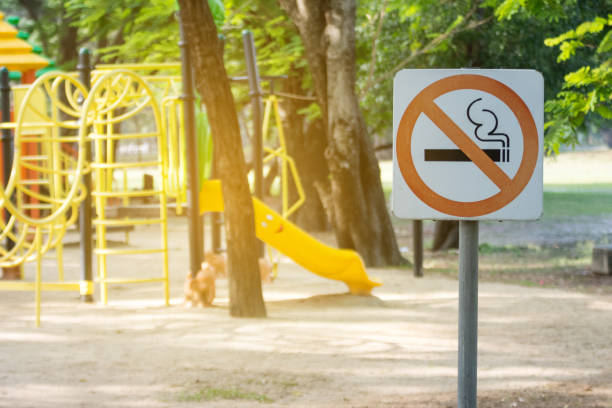 istock no smoking metal sign in the park. 685537428