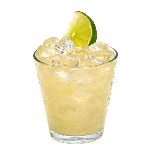 Vodka lemon Vodka lemon with ice and lemon slice on white background carbonated juice stock pictures, royalty-free photos & images