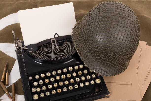 istock US military helmet of the Second World War with old typewriter 685550144