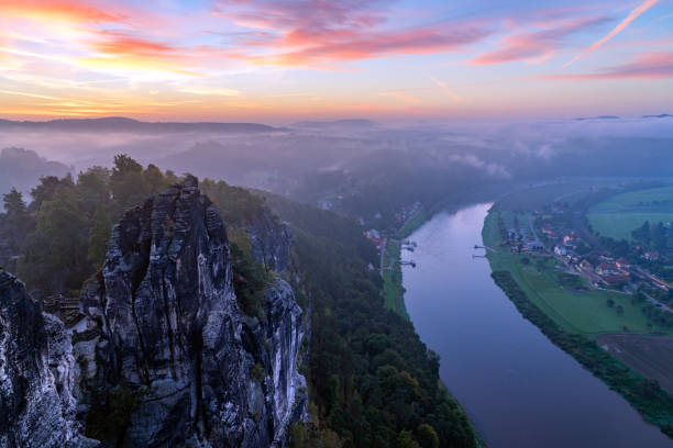 istock View from the Bastai mountain at sunrise, Saxony, Germany 685572720