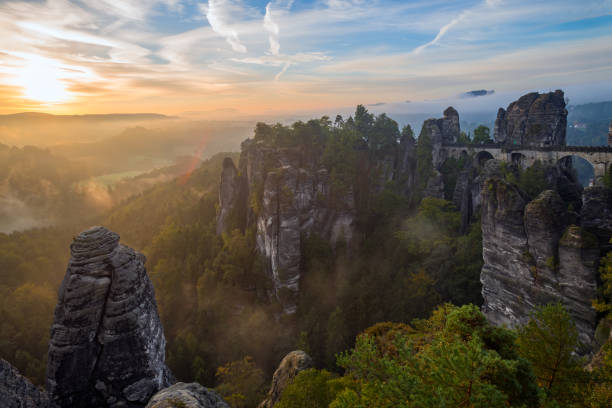 istock View from the Bastai mountain at sunrise, Saxony, Germany 685577856