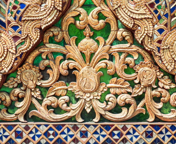 istock Sculptured wood with the golden paint. 685618996
