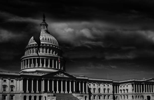 Washington DC capitol crack The United States capitol building with a crack in the dome -- corruption or broken politics concept corruption stock pictures, royalty-free photos & images