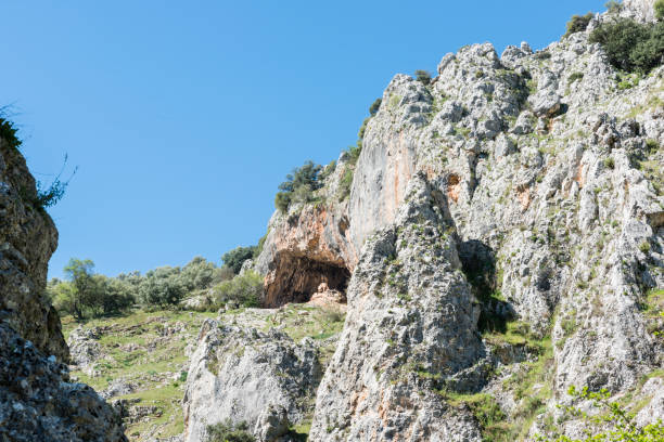 istock rocks with caves and blue sky in andalusia 685643160