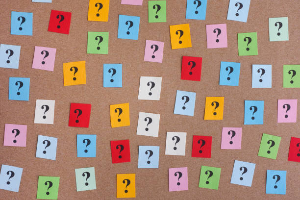 istock Too Many Questions. Colorful paper notes with question marks. 685643960