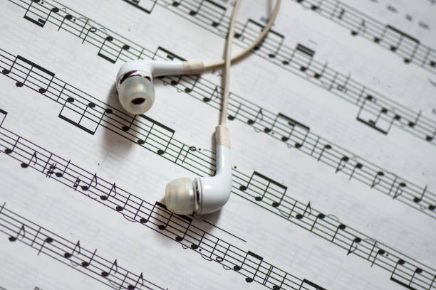 istock Musical score with headphones 685649544