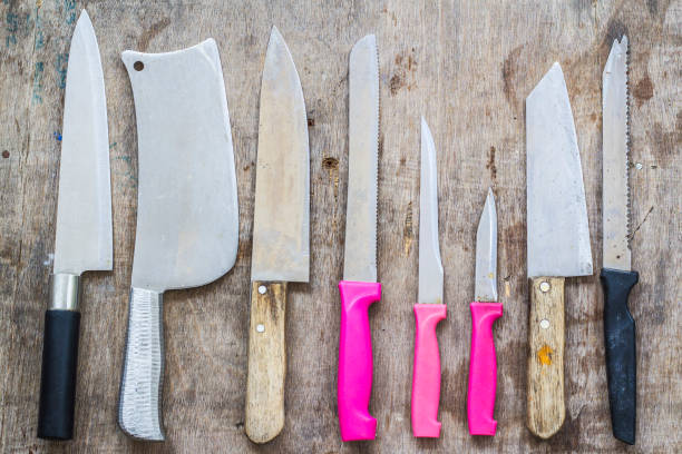 istock Collection of various kitchen knives on old wooden table. 685668642