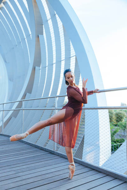 istock hispanic female dancer performing a ballet movement 685669052