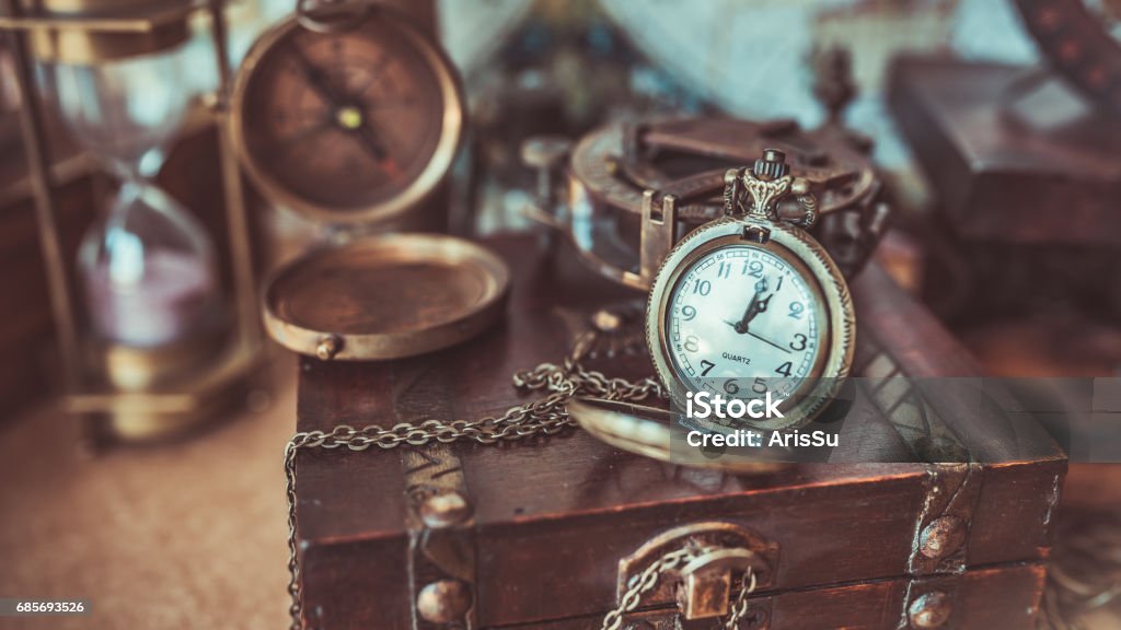 Vintage Photos Compass on wood treasure chest Antique Stock Photo