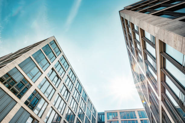 istock modern office buildings in berlin with sun reflection 685694732
