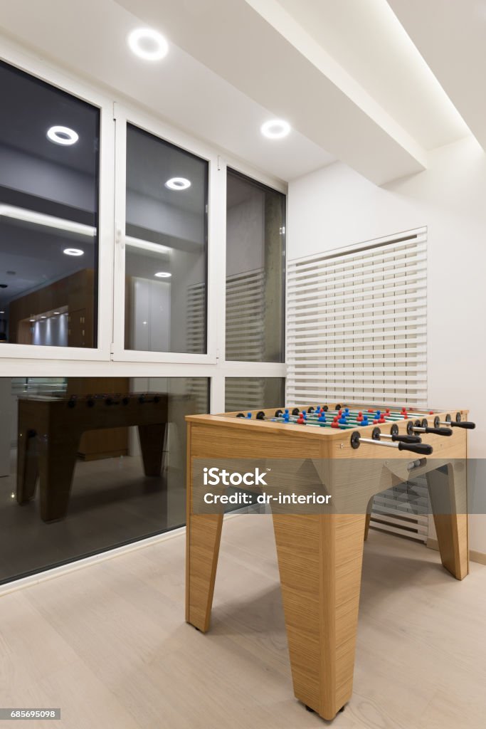 Modern apartment interior Modern apartment interior with table football Apartment Stock Photo