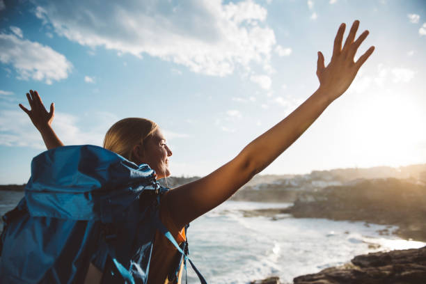 istock Girl opens her arms to the nature 685701442