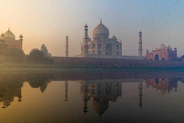 View of stunning and Magnificent monument of love Taj Mahal during sunrise from the bank of river Yamuna at Agra, India