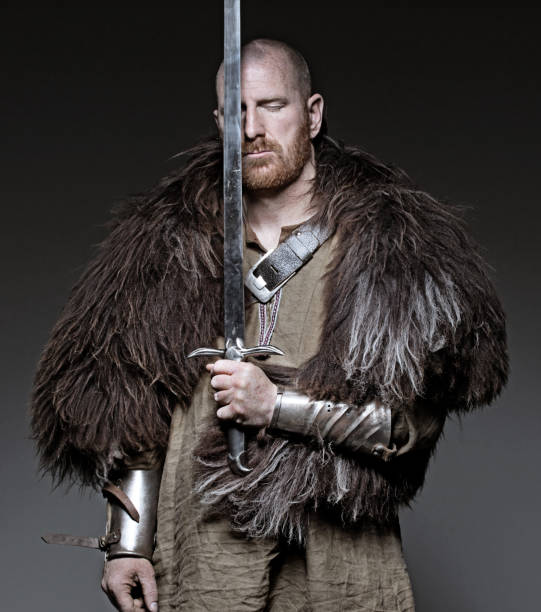 istock Sword wielding viking warrior in emotional pose 685736002