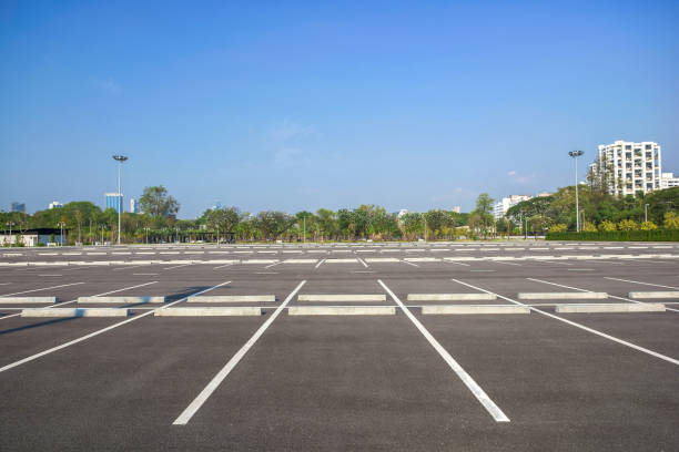 istock Empty parking lot at city center 685741278