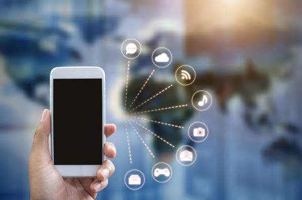 istock Man's hand shows mobile smartphone in vertical position. 685755510
