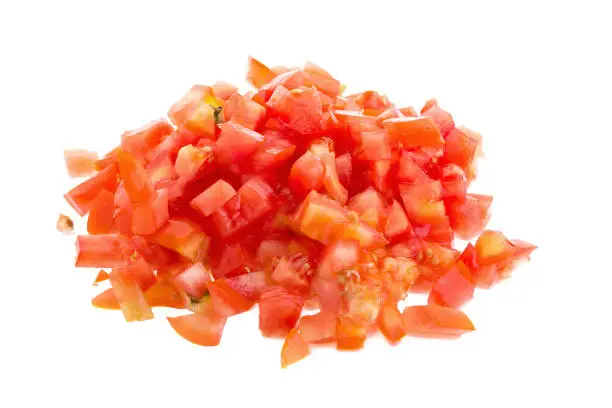 Photo of Chopped tomatoes on white background