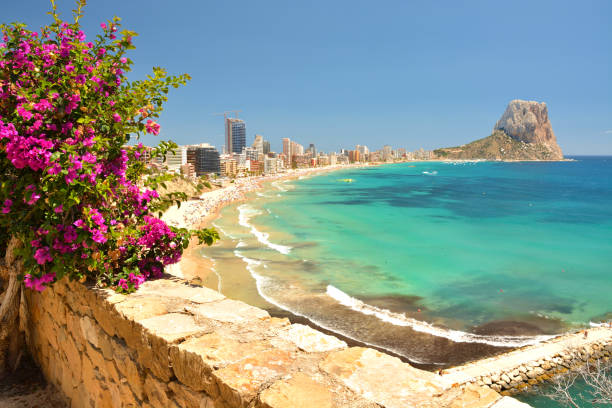 Colorful Mediterranean seascape. Mountain Penyal d'Ifach. Calpe beach, Spain. stock photo