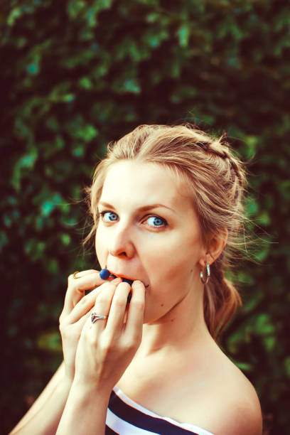 istock Woman in the summer garden 685761832